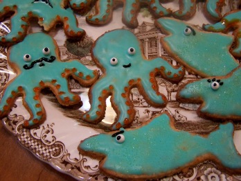 Octopus and shark cookies, with interested facial features.